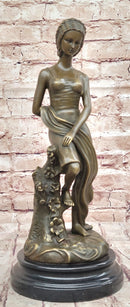 Young Girl Sitting on Tree Near Pond - Bronze Art by Milo