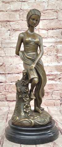 Young Girl Sitting on Tree Near Pond - Bronze Art by Milo